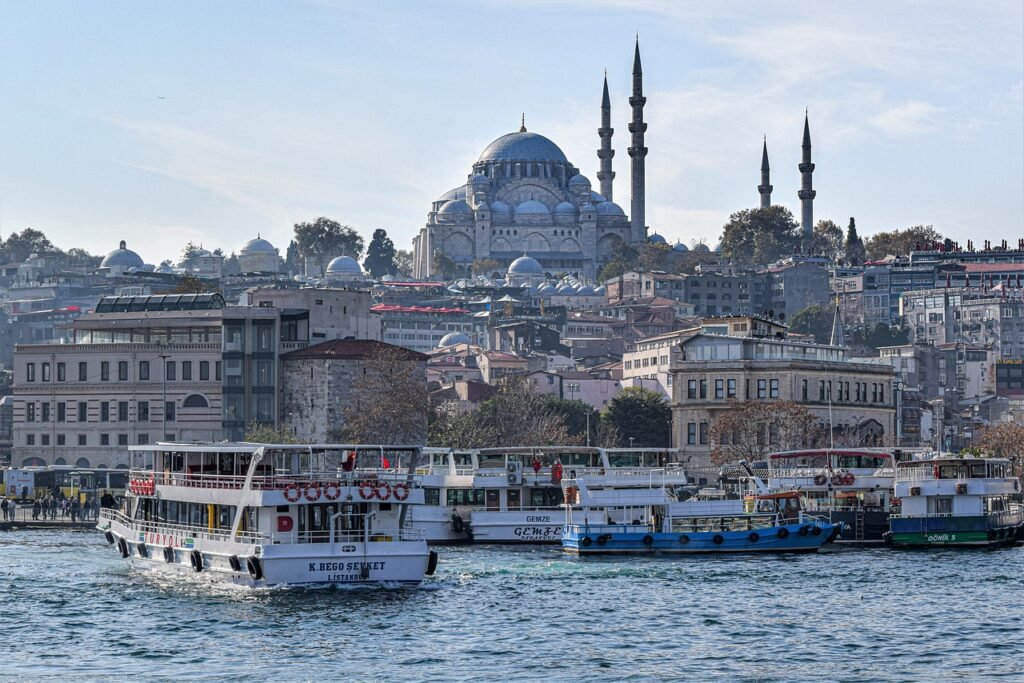 mosque, river, boat-6835457.jpg